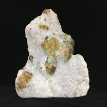 Spinel with Pargasite and Chondrodite on Marble Matrix