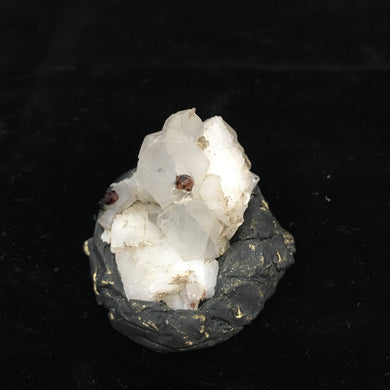 Spessartine on Quartz