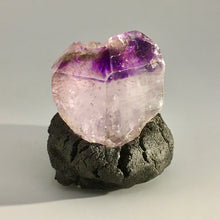 Amethyst with Harlequin